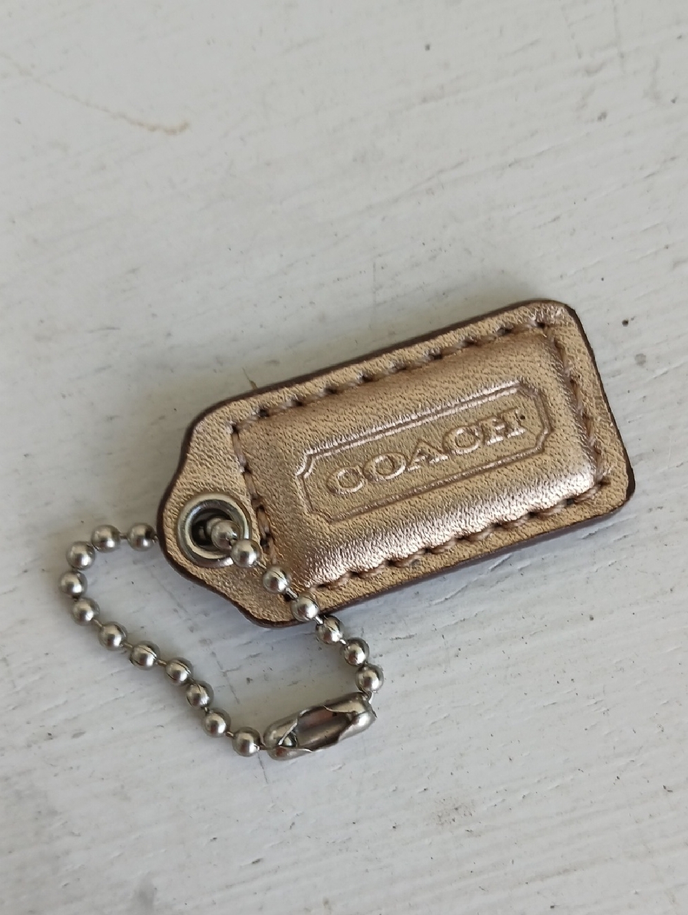 COACH Hang Tag Gold
